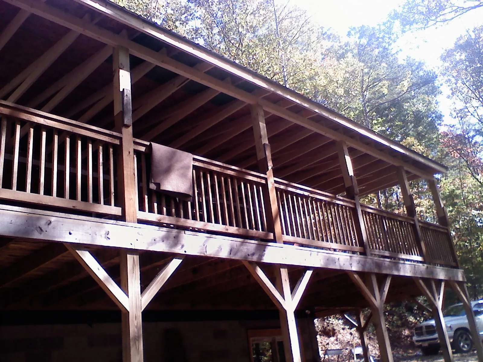 Timber framing under a new elevated porch and deck — Roof Leak Repair in Evangeline by Roofing Brothers